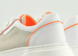 Ladies' sports shoes in white and orange colours Thumb