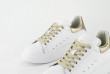 Ladies' sneakers in white and gold Thumb