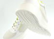 Ladies' sports shoes in white and electric green Thumb