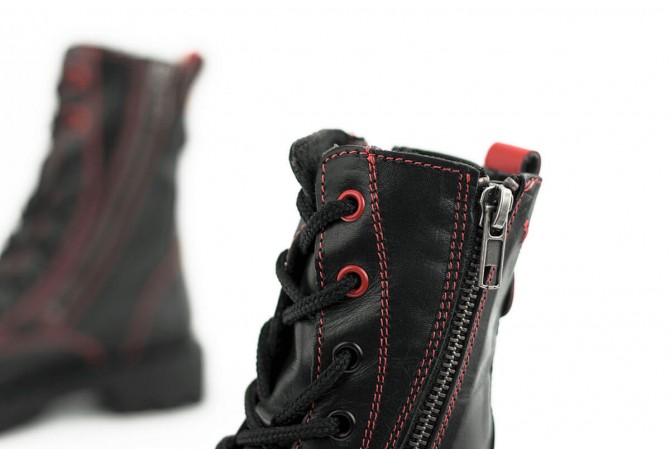 Black children's boots with zips and shoelaces