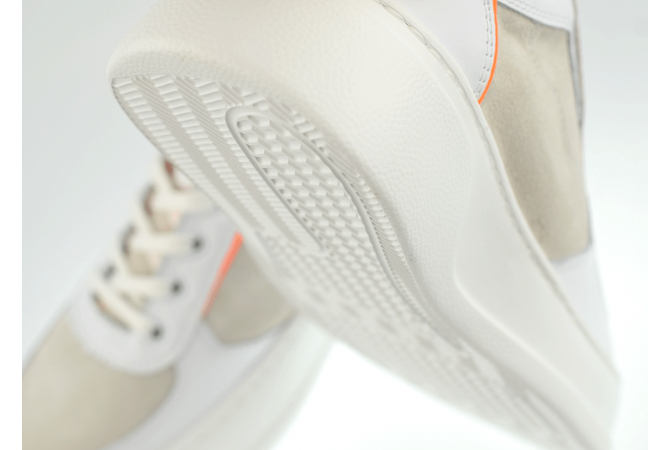 Ladies' sports shoes in white and orange colours