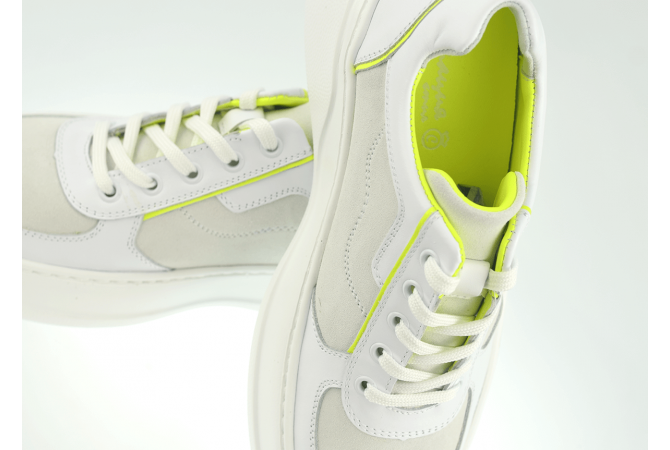 Ladies' sports shoes in white and electric green